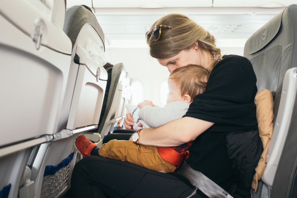 child sleep on a plane